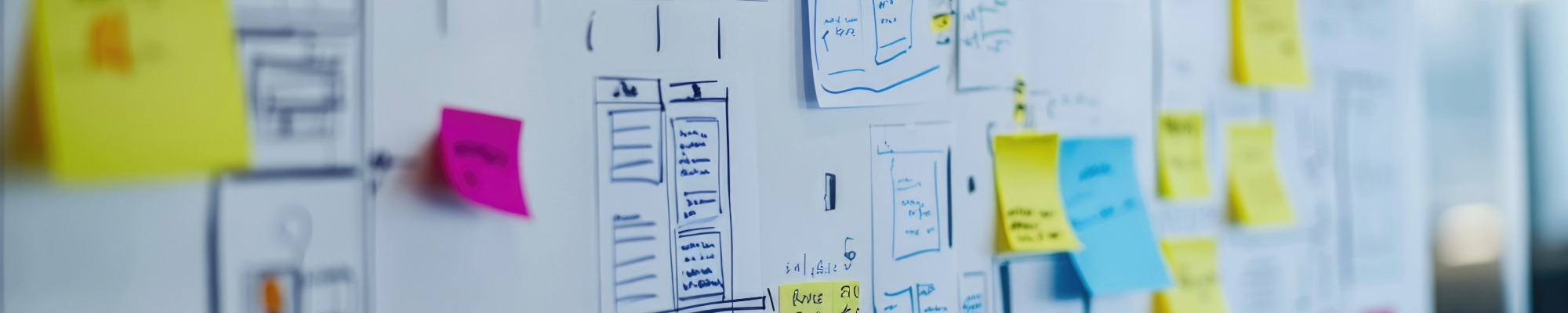 whiteboard with unclear writing