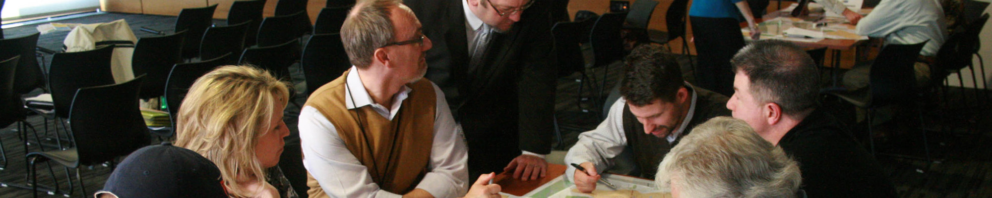 people talking at a table