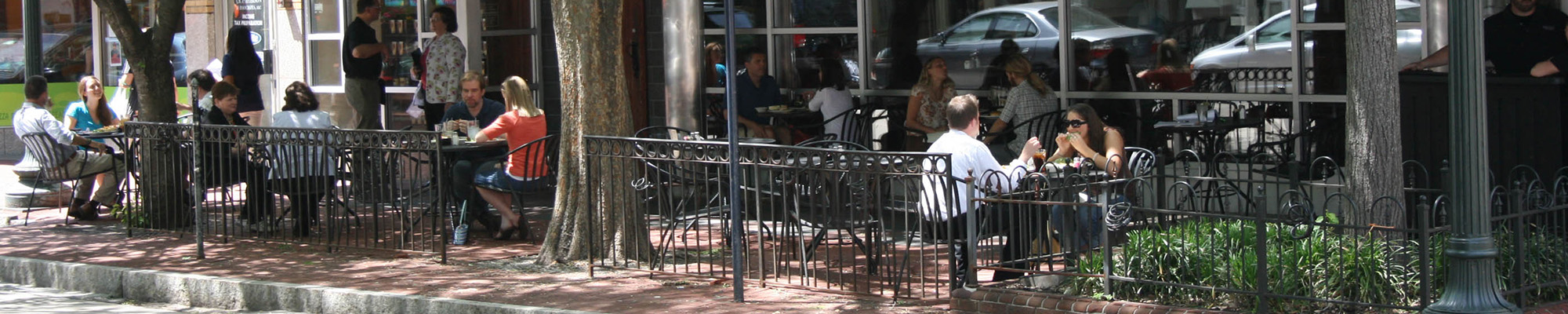 people at outdoor seating in front of resturant